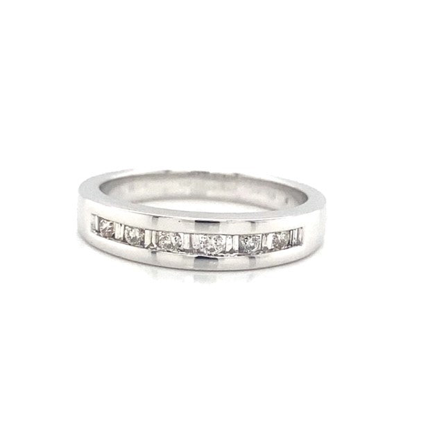 Round Brilliant and Baguette Cut Channel Set Diamond Alternating Ring