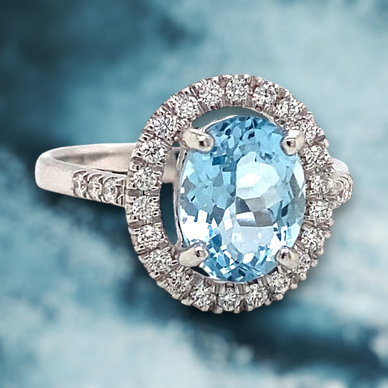 Oval Aquamarine and Diamond Halo Ring