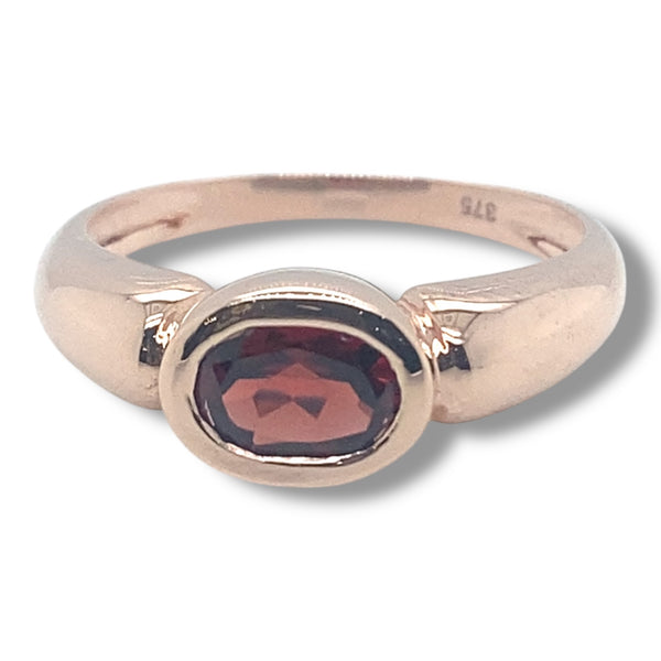 Rose Gold Ring with Bezel Set Garnet in