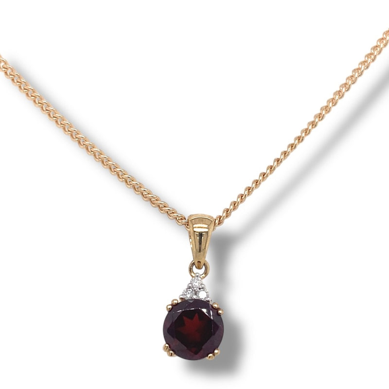 Garnet and Trilogy Diamond Pendant