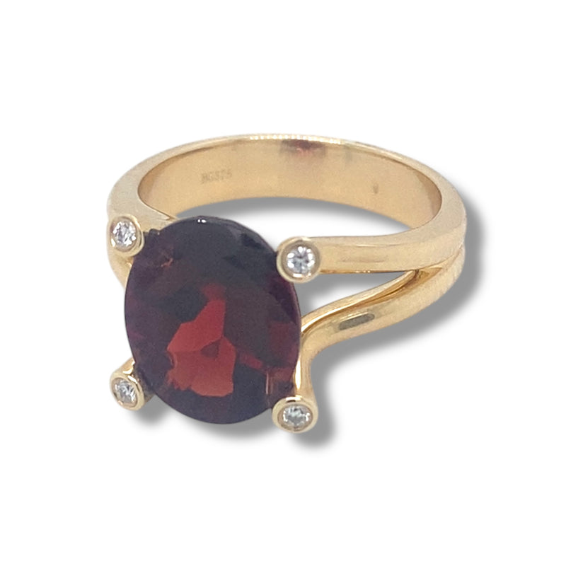 Oval Garnet and Diamond Ring